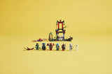 LEGO NINJAGO 71841 – Dragonisk stormlandsby – landsby, spinner og karakterfigurer opstillet samlet